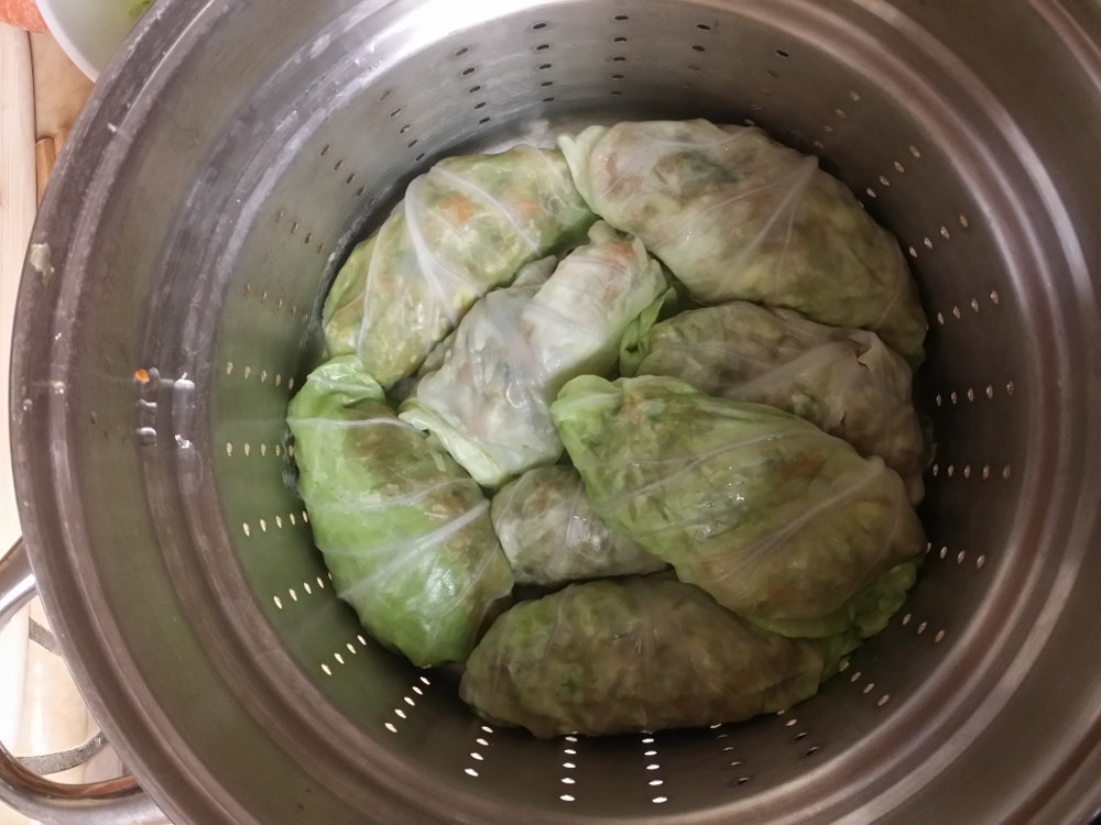 Stuffed cabbage leaves ready for steaming